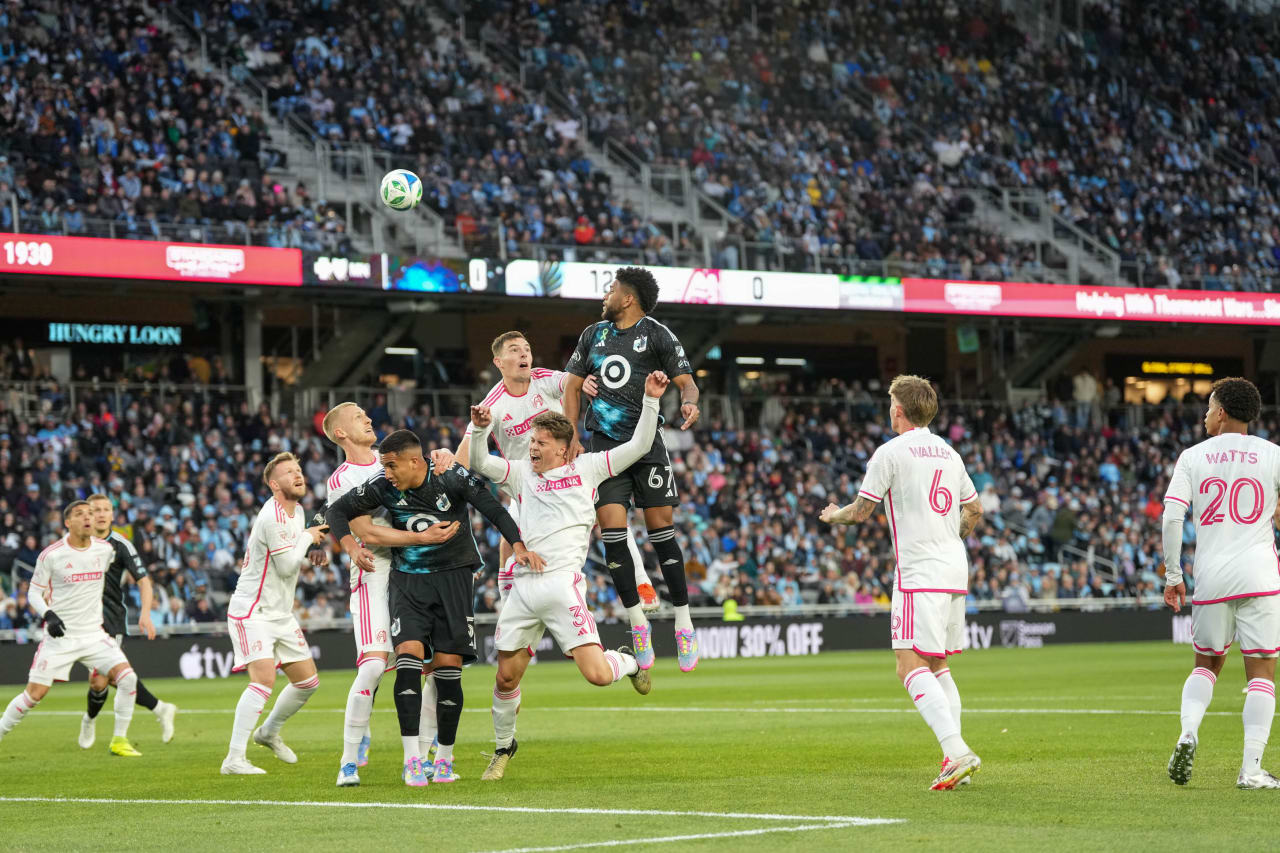 Carlos Harvey rises for a corner